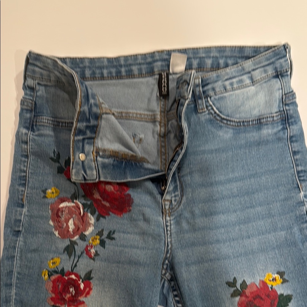 Divided Light Blue Jeans with Red and Yellow Floral Design Size 12 Pre-Owned